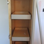 Close up of pull out shelves in pantry.