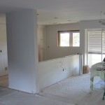 View of the kitchen from the living room. Love how lighter and brighter it looks.